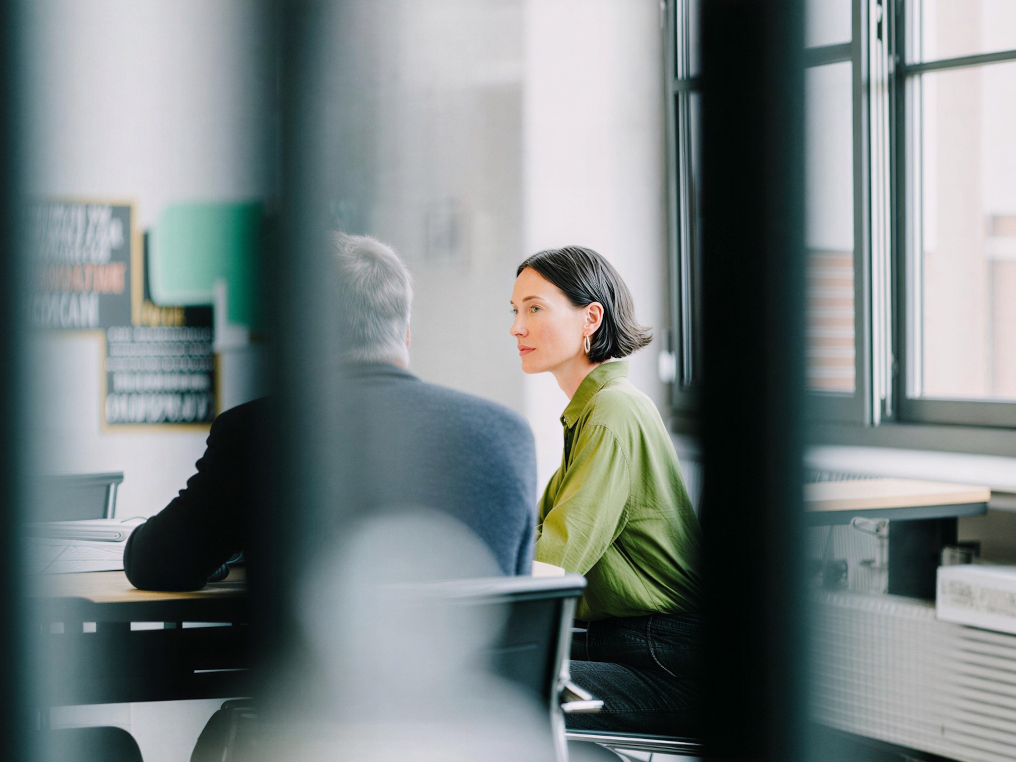 A conversation between two colleagues