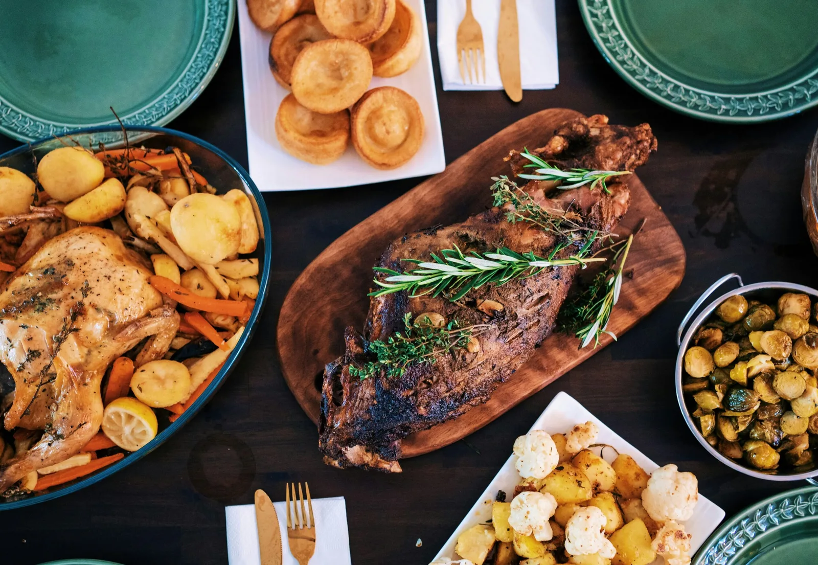 An overhead view of food shared across a restaurant table