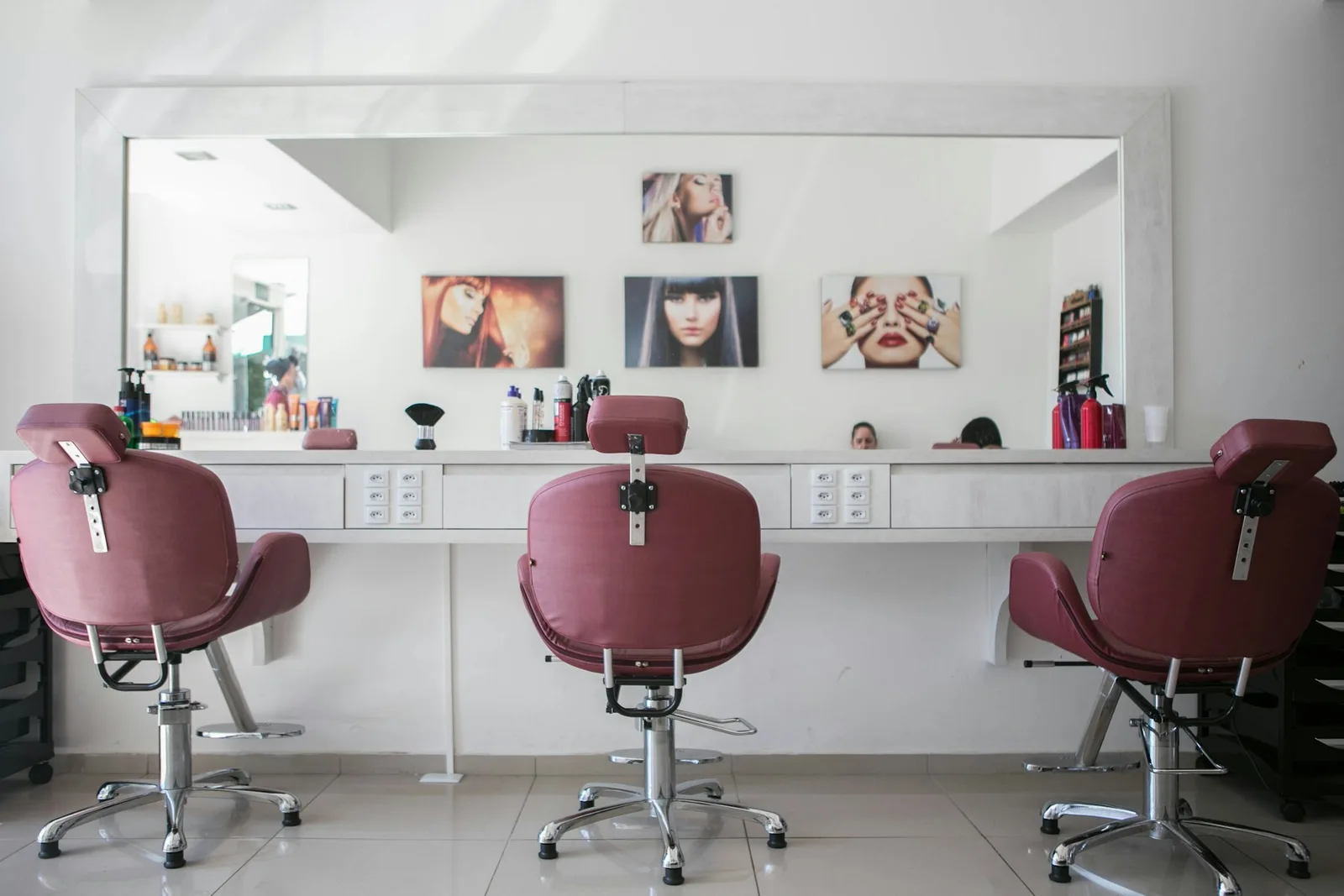 Salon chairs and mirrors in a bright interior